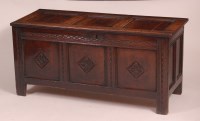 Lot 838 - An early 18th century joined oak three panel...