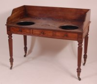 Lot 839 - An early 19th century mahogany washstand, in...