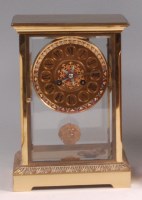 Lot 752 - A circa 1900 French gilt brass four glass...