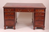 Lot 785 - An Edwardian mahogany twin pedestal kneehole...