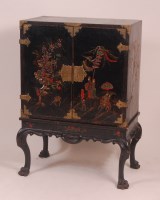Lot 828 - A circa 1900 Japan lacquered fitted cabinet on...