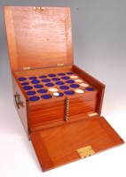 Lot 114 - A Victorian mahogany coin cabinet, the...