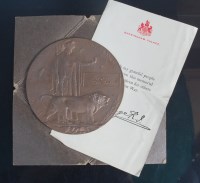 Lot 263 - A WWI bronze memorial plaque naming George...