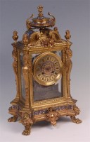 Lot 802 - A circa 1900 French gilt brass and champleve...