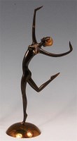 Lot 23 - A 1930s Scandinavian lacquered brass...