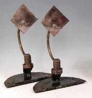 Lot 42 - A pair of welded steel freestanding pricket...