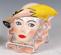 Lot 92 - A Crown Devon painted and glazed ceramic wall...