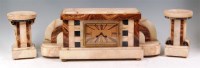 Lot 60 - An Art Deco multi-marble three piece clock...