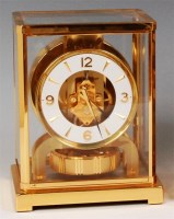 Lot 77 - A Jaeger le Coultre lacquered brass cased...