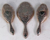 Lot 29 - An Art Nouveau silver three piece dressing...