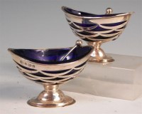 Lot 111 - A pair of Edwardian silver pedestal table...
