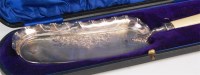 Lot 118 - An Edwardian cased silver crumb scoop, with...