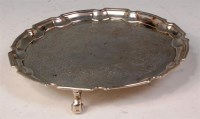 Lot 157 - A George II silver salver, having a raised...