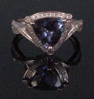Lot 179 - A contemporary 14ct white gold dress ring, set...