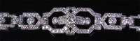 Lot 181 - An Art Deco platinum and diamond cocktail...