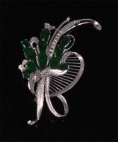 Lot 222 - A contemporary 18ct white gold and jade set...
