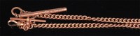 Lot 224 - A 9ct gold curblink watch chain with Albert...