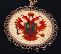 Lot 228 - A 9ct gold mounted pendant in the form of an...