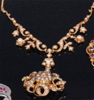 Lot 239 - An Edwardian 15ct gold seed pearl set necklet,...