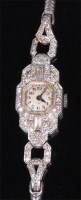 Lot 204 - An Art Deco white metal diamond set ladies...