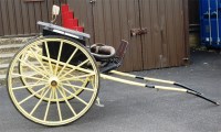 Lot 284 - A Victorian governess cart, having twin raised...