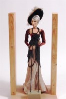 Lot 252 - Angus McBean - a prop of Mae West, in standing...