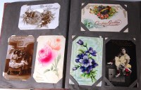 Lot 521 - Greetings cards - three albums to include;...