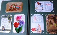 Lot 522 - Greetings cards - three albums to include;...