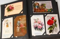 Lot 518 - Greetings cards - two albums being largely...