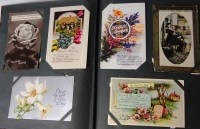 Lot 526 - Greetings cards - two albums to include;...