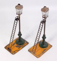 Lot 422 - 2x Bing GI oil lamp standards with ladder on...