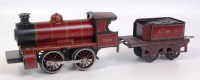 Lot 414 - A Bing maroon GI clockwork 0-4-0 loco with...