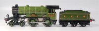 Lot 433 - A Hornby repainted green clockwork 4-4-0 LNER...