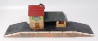 Lot 513 - A Bing lithographed wayside station with...