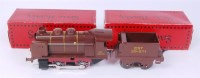 Lot 526 - A Hachette Hornby type brown clockwork 0-4-0...