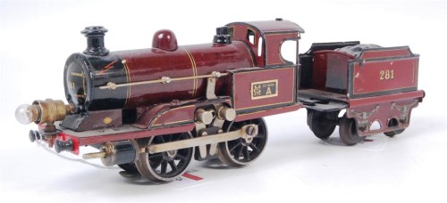 Lot 556 - A Marklin maroon 20v electric 0-4-0 loco with '...