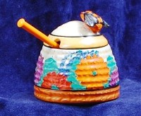 Lot 76 - A Clarice Cliff painted and glazed pottery...