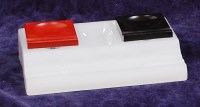 Lot 19 - An Art Deco moulded glass desk stand, having...
