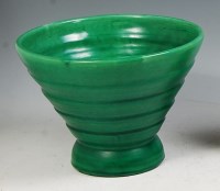 Lot 128 - A Charles Brannam Art Deco green glazed...