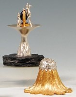 Lot 142 - A modern silver ornamental sculpture depicting...