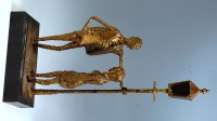Lot 155 - Follower of Kenneth Carter - gilt metal...