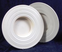 Lot 124 - A pair of Keith Murray matt-white glazed...