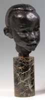 Lot 308 - A mid 20th century bronze bust of an African...