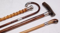 Lot 314 - A whangee swagger stick, with white metal...
