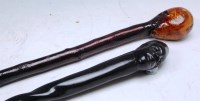 Lot 315 - A West African ebony walking cane, with...