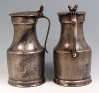 Lot 325 - A pair of French pewter lidded flagons, in the...