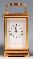Lot 532 - A modern French lacquered brass carriage clock,...