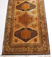 Lot 541 - A Persian silk ghoum rug, the central ground...