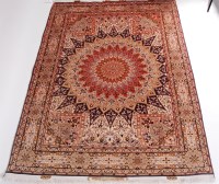 Lot 542 - A Persian woollen fineweave Tabriz type rug,...