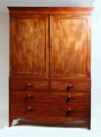 Lot 551 - A Regency mahogany linenpress, the upper...